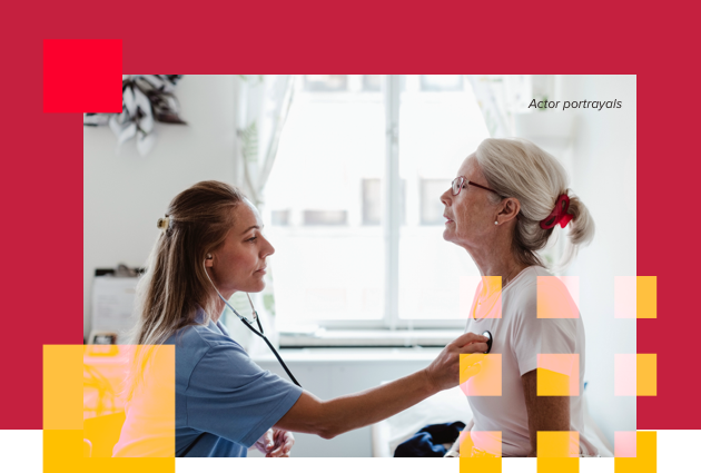 Side view of doctor examining senior patient in medical clinic. Actor portrayals.